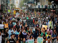 Climate protesters arrested in march on Wall Street