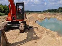 Tough action curtails sand-mining