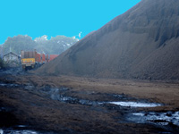 Sewri’s coal mountains smoulder, release toxic sulphur compounds