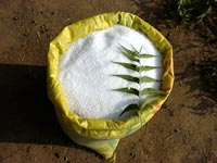 Urea coated with neem