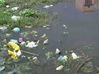 Garbage heaps pile up, cause health scare